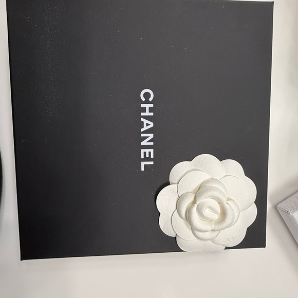 CHANEL Black Box with White Floral Accent